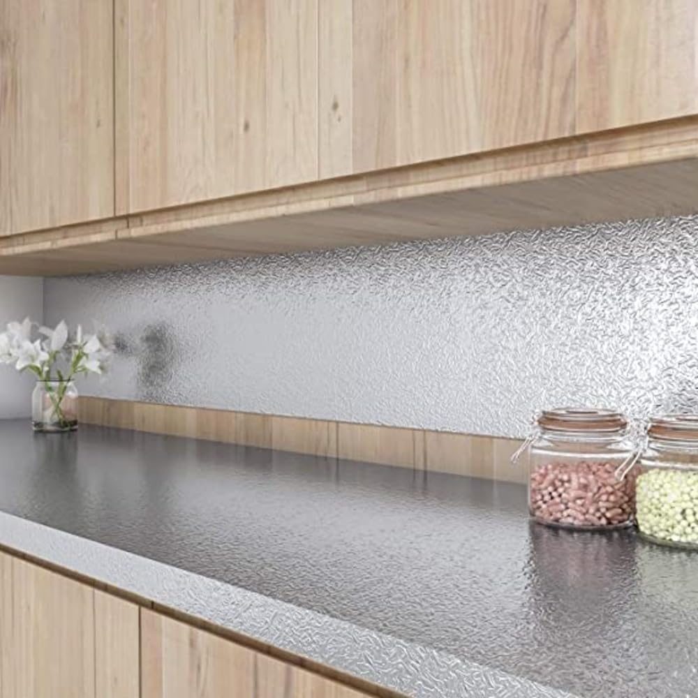 Foil on a kitchen counter and backsplash